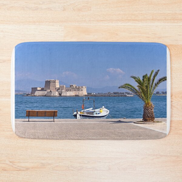 Item preview, Small fishing boat and Bourtzi water fortress in Nafplio, Peloponnese, Greece designed and sold by goceris.