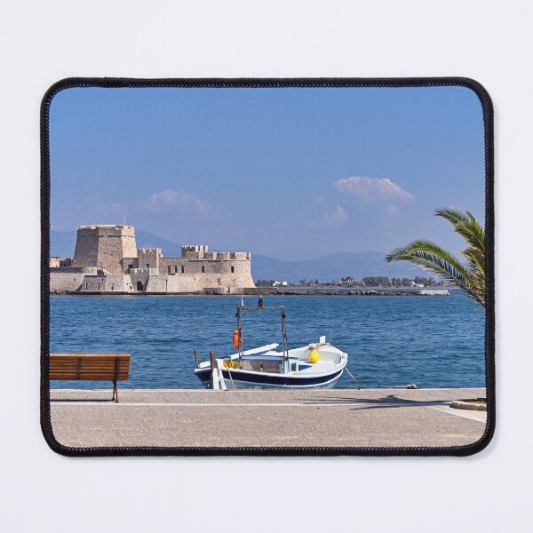 Item preview, Small fishing boat and Bourtzi water fortress in Nafplio, Peloponnese, Greece designed and sold by goceris.