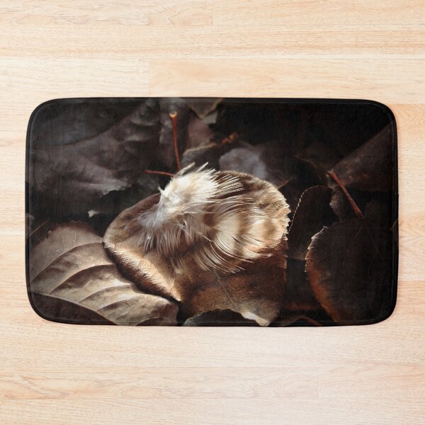 Item preview, Brown And White Striped Feather On Dark Leaves designed and sold by FeatherfallSTU.