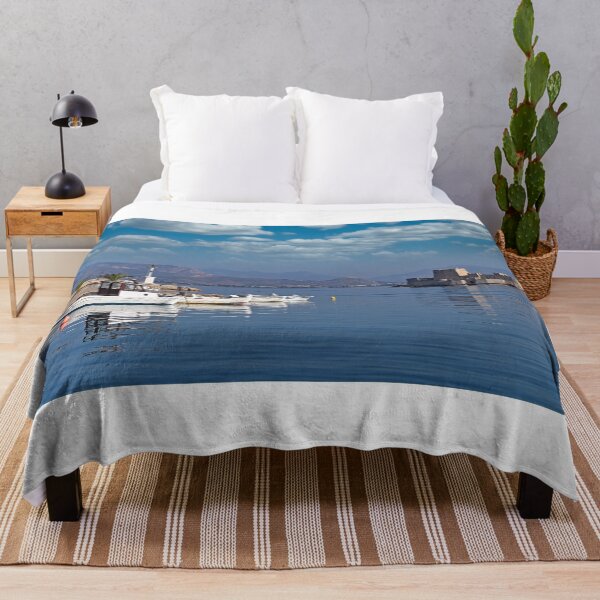 Item preview, Bourtzi water fortress and port with boats in Nafplio, Peloponnese, Greece designed and sold by goceris.