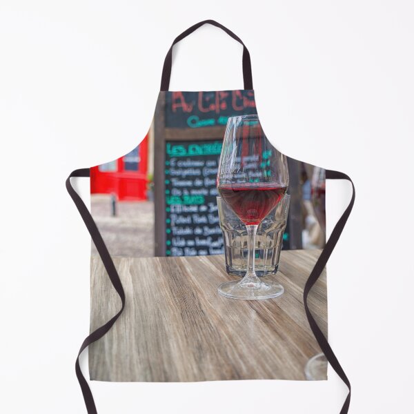 Item preview, Two glasses of red wine and a bottle on a table with a blurred menu in France designed and sold by Photopat.