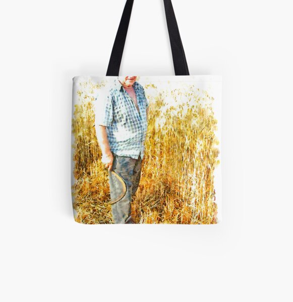 Farmer with sickle between the wheat All Over Print Tote Bag