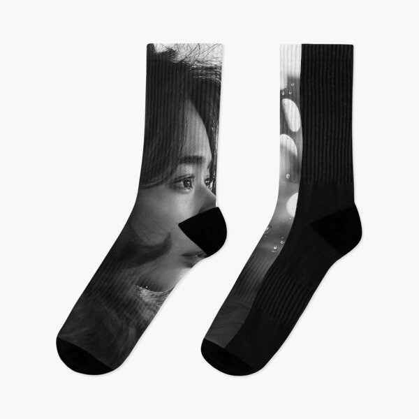 Item preview, Reflective Moment in a Black and White Portrait of a Woman – Street Photography designed and sold by regnumsaturni.
