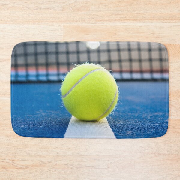 Item preview, Vibrant tennis ball on a blue court under bright light designed and sold by homydesign.