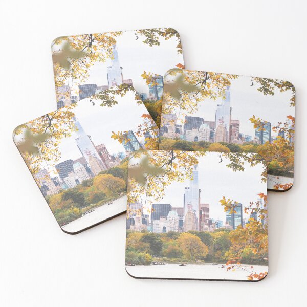 Item preview, New York, USA I Central Park lake in the nature with autumn aesthetic and pastel orange tones in the wild tree leaves with the New York skyline, its skyscraper buildings and grandiose architecture designed and sold by Julie Travel Photography.