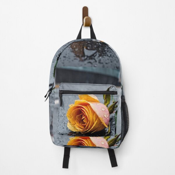 Item preview, Echoes of Yesterday. A solitary yellow rose lies on the rain-soaked street, whispering tales of forgotten moments. designed and sold by Wannaprasert.
