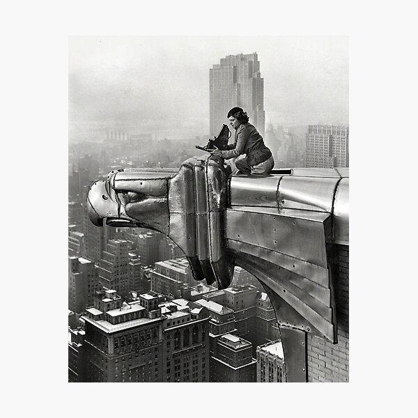 Item preview, The Silver Eagle, female photographer Margaret Bourke-White sitting with her camera atop New York Skyscraper city skyline vintage black and white photograph designed and sold by Jéanpaul  Ferro.