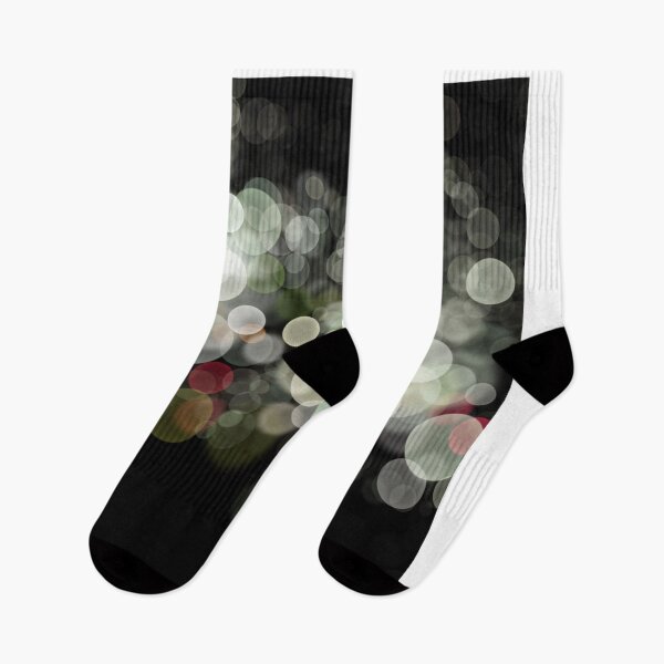 Item preview, Shimmering bokeh light glows on black background designed and sold by navitalidesign.