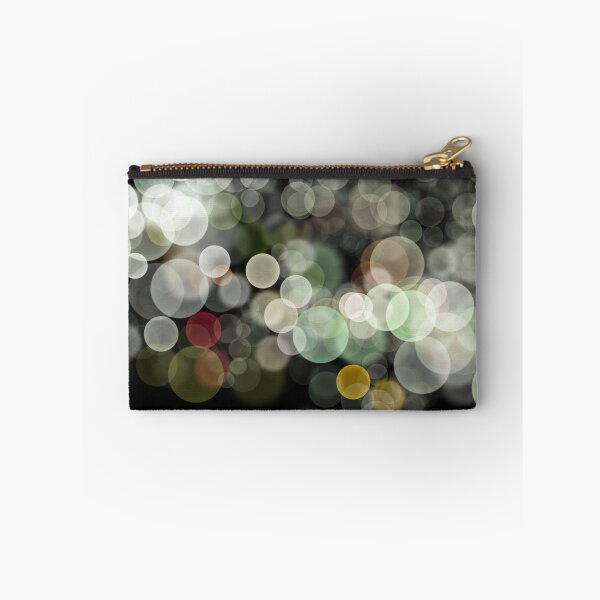 Item preview, Shimmering bokeh light glows on black background designed and sold by navitalidesign.