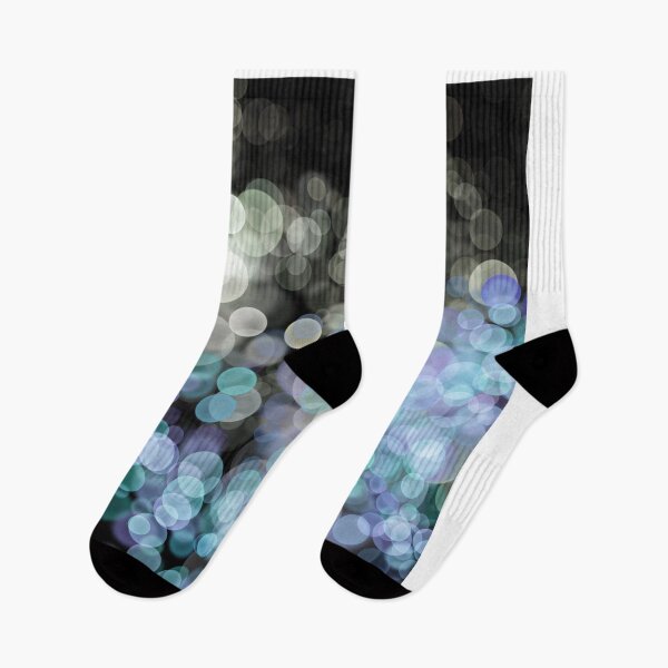 Item preview, Blue Shimmering bokeh light glows on black background designed and sold by navitalidesign.