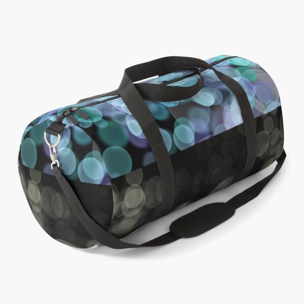 Item preview, Blue Shimmering bokeh light glows on black background designed and sold by navitalidesign.