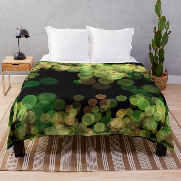 Item preview, Green Shimmering bokeh light glows on black background designed and sold by navitalidesign.