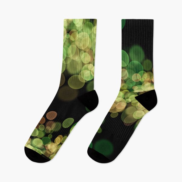 Item preview, Green Shimmering bokeh light glows on black background designed and sold by navitalidesign.