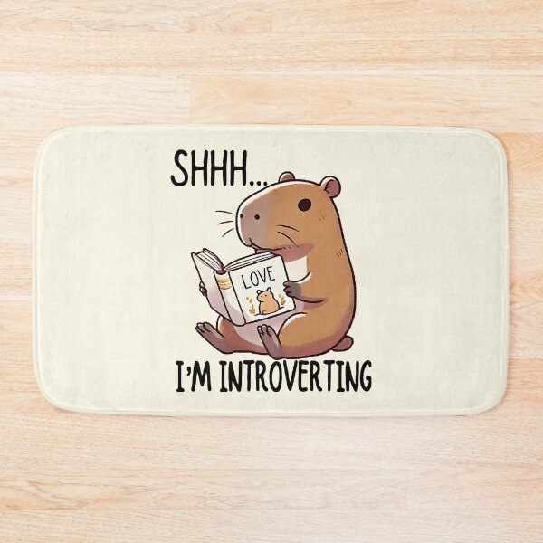 Item preview, Funny cute Capybara Reading - Shhh I'm Introverting - Introvert Humor. Gift for capybara lovers, book lovers and introverts designed and sold by Unitepeople.