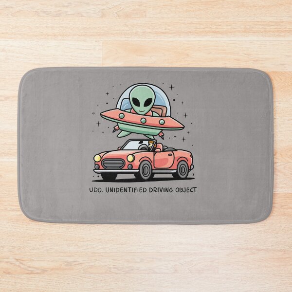 Item preview, Funny Space Alien over Car says UDO Unidentified Driving Object designed and sold by Nature's Fancy.