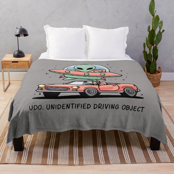 Item preview, Funny Space Alien over Car says UDO Unidentified Driving Object designed and sold by Nature's Fancy.