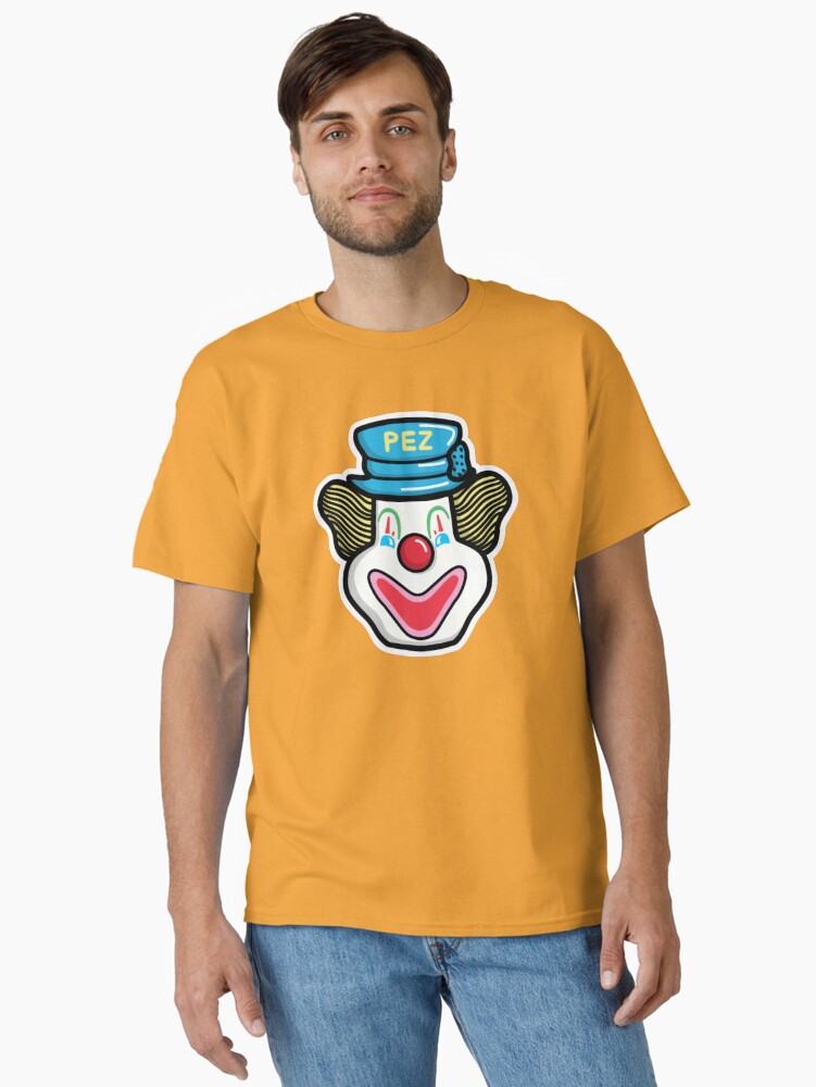 Imagen 1 de 7, Camiseta clásica con la obra Cabeza de Peter Pez - Amarillo, diseñada y vendida por emily-pez.
