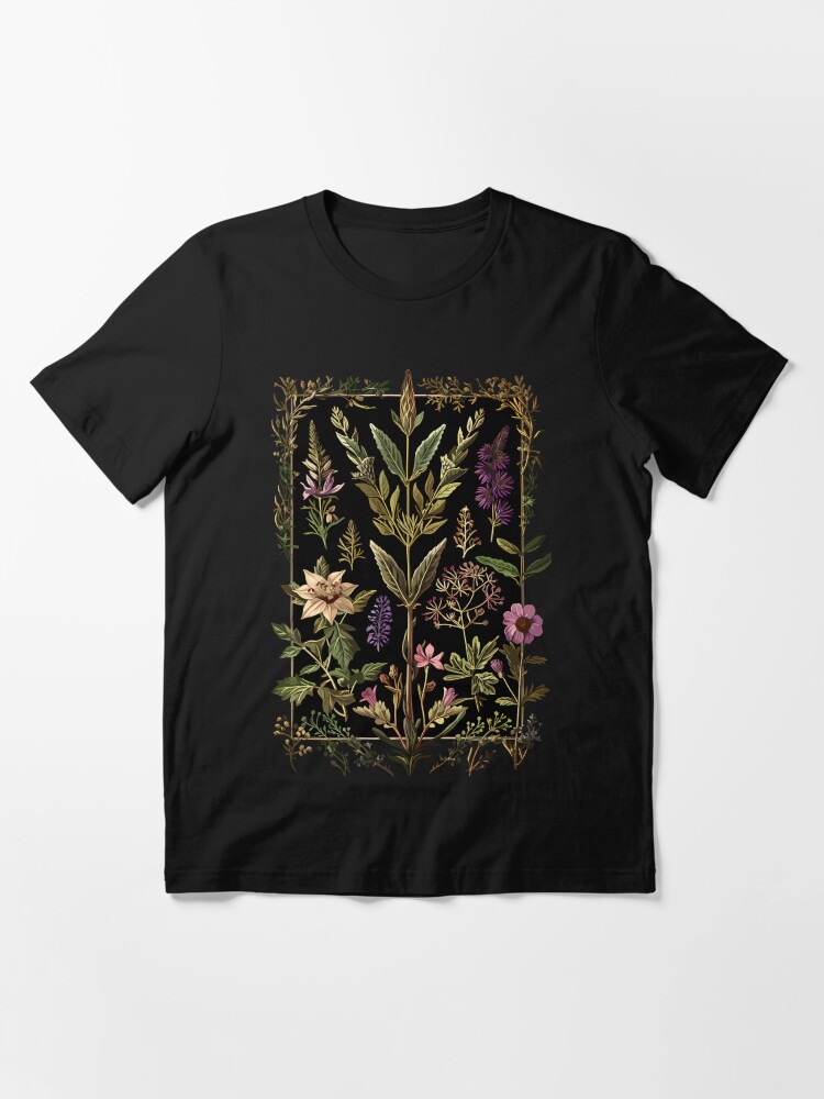 Imagen 3 de 7, Camiseta esencial con la obra Hierbas oscuras de bruja victoriana, diseñada y vendida por Enyr.