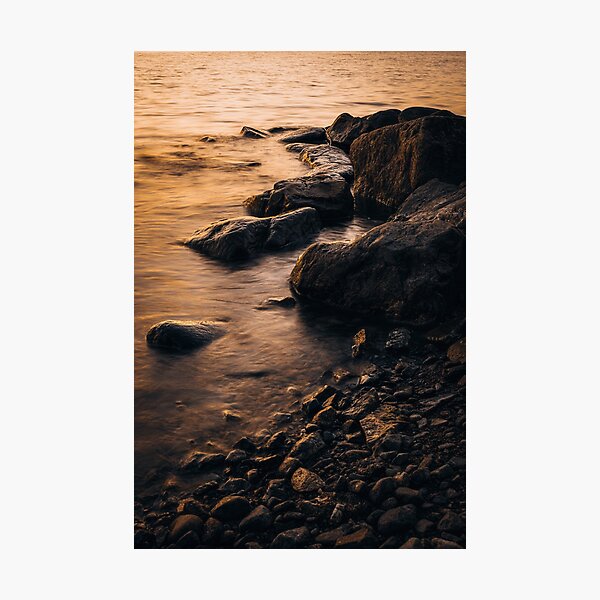 Item preview, Sunset on a rocky beach designed and sold by Tom Heinola.