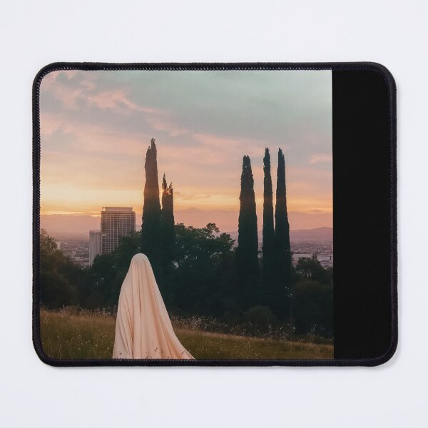 Item preview, Veiled Woman On A Meadow With A City In The Background At Sunset - Photography designed and sold by regnumsaturni.