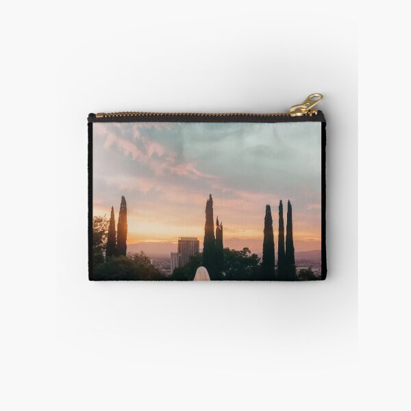 Item preview, Veiled Woman On A Meadow With A City In The Background At Sunset - Photography designed and sold by regnumsaturni.