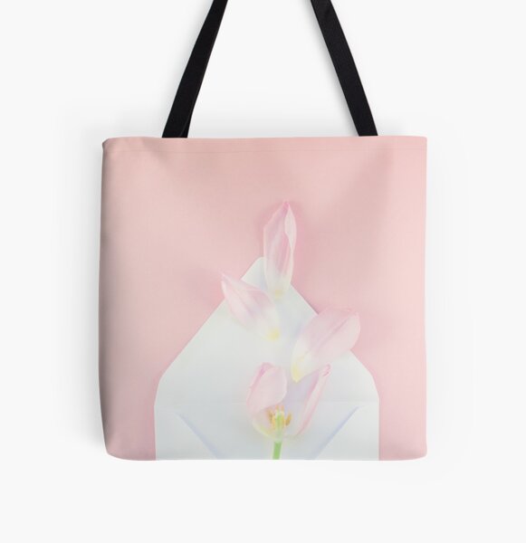 Item preview, Pink tulip with petals in opened paper envelope designed and sold by dvoevnore.