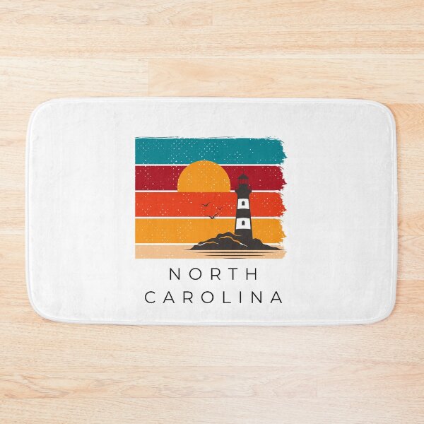 Item preview, North Carolina lighthouse sunset designed and sold by RockyTees1.