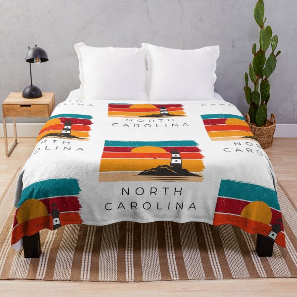 Item preview, North Carolina lighthouse sunset designed and sold by RockyTees1.