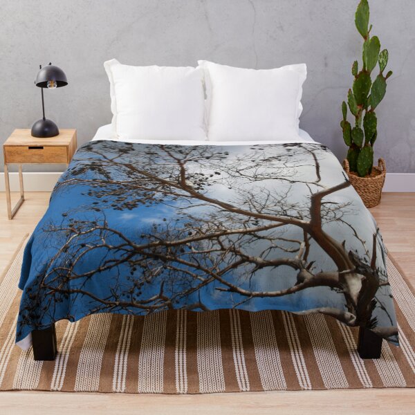 Item preview, The Skeleton of A Pine Tree Against Sky and Clouds designed and sold by taiche.