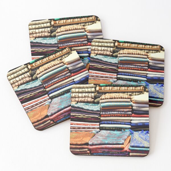 Item preview, A collection of neatly stacked folded scarves designed and sold by Anastasia Kaneva.