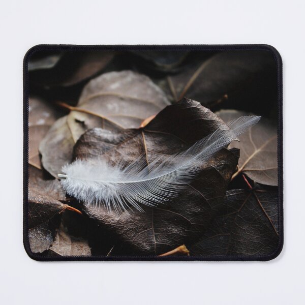 Item preview, Delicate White Feather On Dark Fallen Leaves designed and sold by FeatherfallSTU.