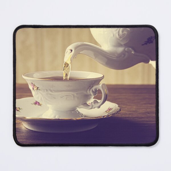 Item preview, A cup of tea being poured from an old-fashioned teapot at tea time designed and sold by Vetagio.