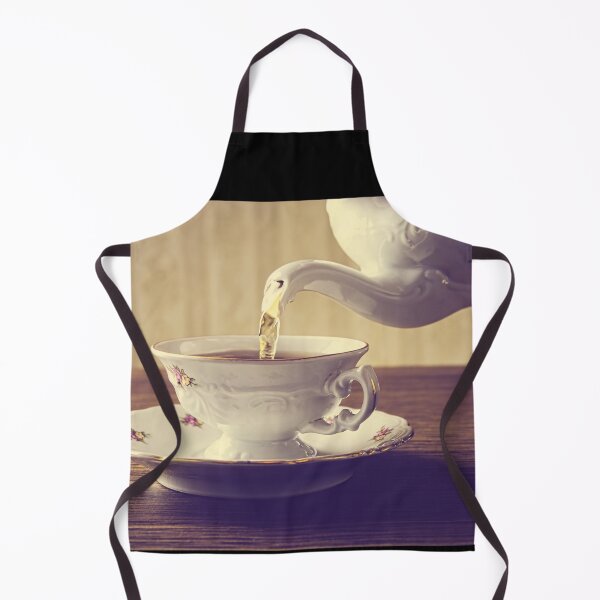 Item preview, A cup of tea being poured from an old-fashioned teapot at tea time designed and sold by Vetagio.