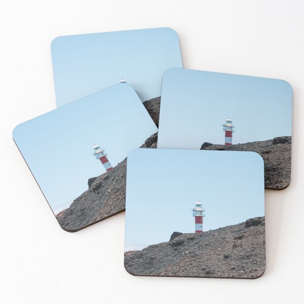 Item preview, Lighthouse behind rocks designed and sold by rhosbahu.