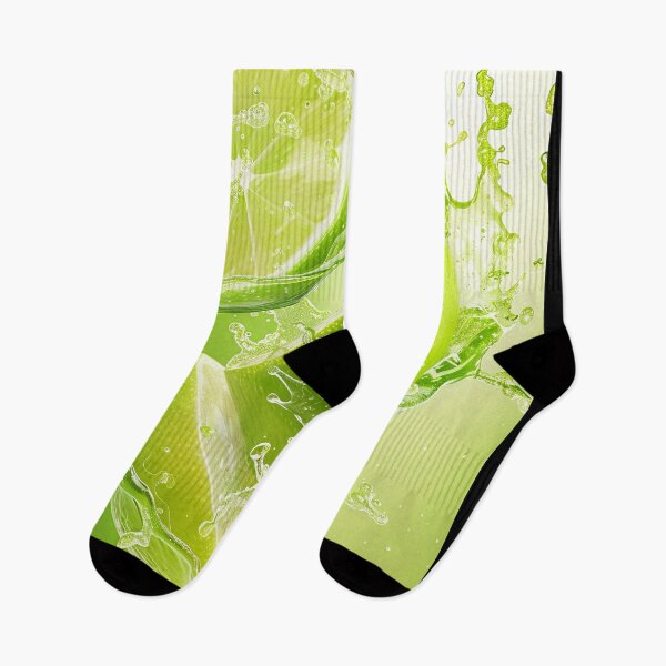 Item preview, Fresh limes splashing in water on a green background. designed and sold by Jerhus.