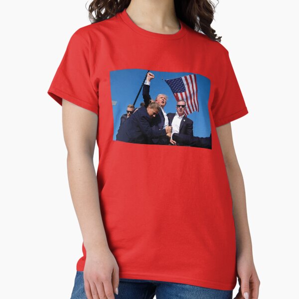 Item preview, Trump Bloody With Fist Raised Surviving Assassination Attempt designed and sold by akool.