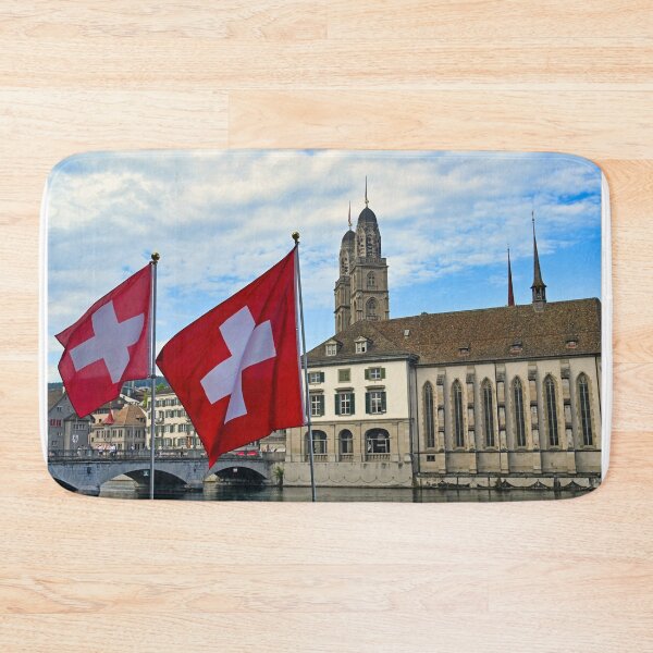 Item preview, Swiss flag in front of the Grossmunster cathedral in Zurich, Switzerland designed and sold by goceris.
