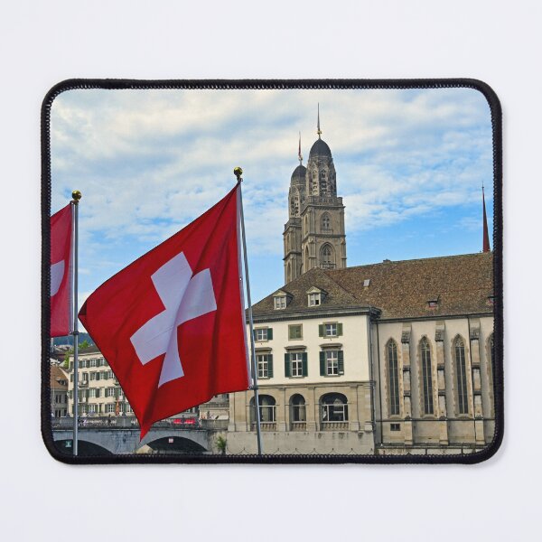Item preview, Swiss flag in front of the Grossmunster cathedral in Zurich, Switzerland designed and sold by goceris.