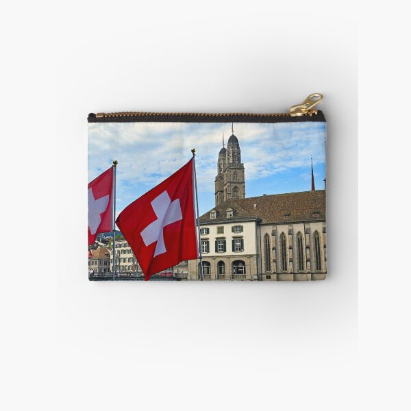 Item preview, Swiss flag in front of the Grossmunster cathedral in Zurich, Switzerland designed and sold by goceris.