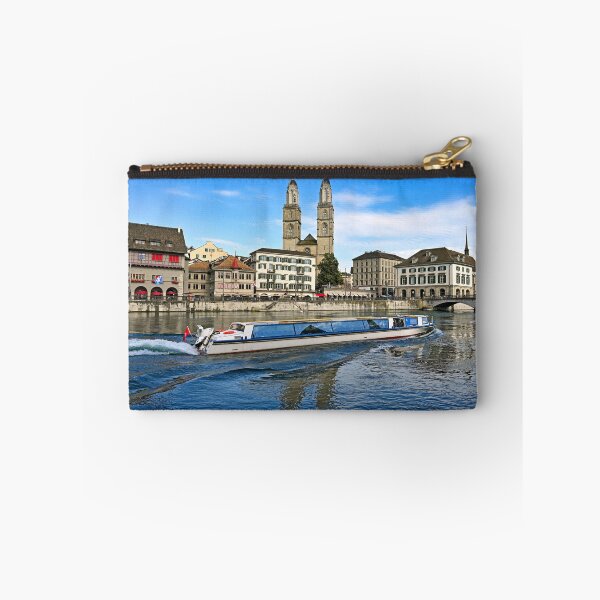 Item preview, Historic Zurich city center with famous Grossmunster churh and a tourist boat sails on the river Limmat, Switzerland designed and sold by goceris.