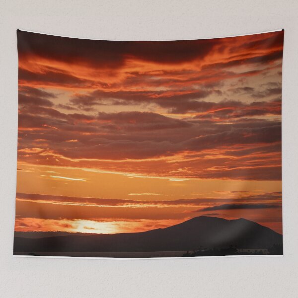 Item preview, Glowing Orange Sunset With Clouds And Hills Silhouette designed and sold by Harmony Of The Mind.