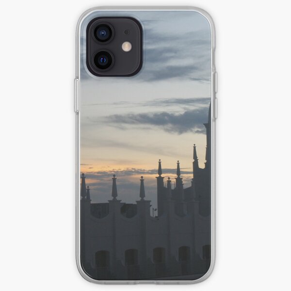 Fairy-tale castle with turrets and spiers adorned by colors of aurora iPhone Soft Case