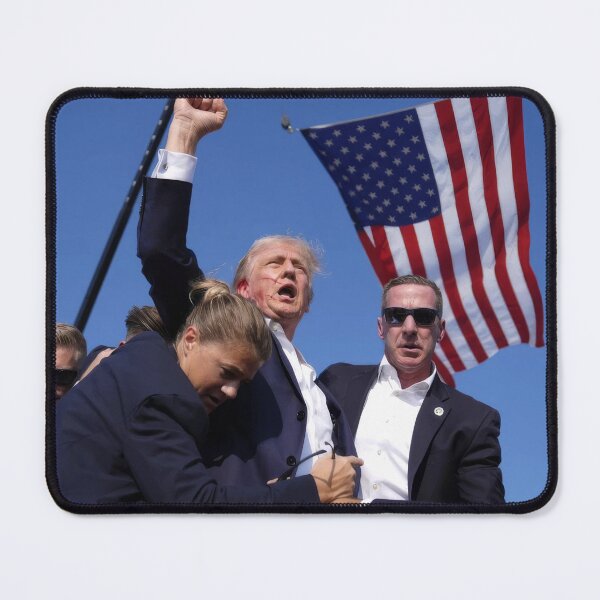 Item preview, Defiant Donald J. Trump Moments After Assassination Attempt designed and sold by ZipperDragon88.