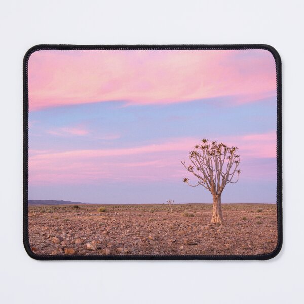 Item preview, Lone Quiver tree in sunset landscape designed and sold by Images by Chris de Blank.