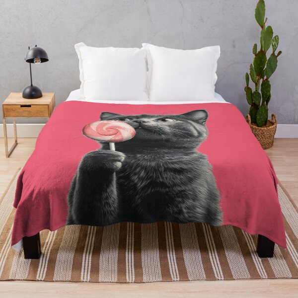 Item preview, Gatito negro sosteniendo una paleta arremolinada designed and sold by WIKKI-White.