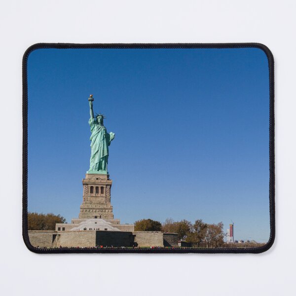Item preview, Statue of Liberty: An Icon of New York Against a Clear Blue Sky designed and sold by World Wondering Travel Photography.