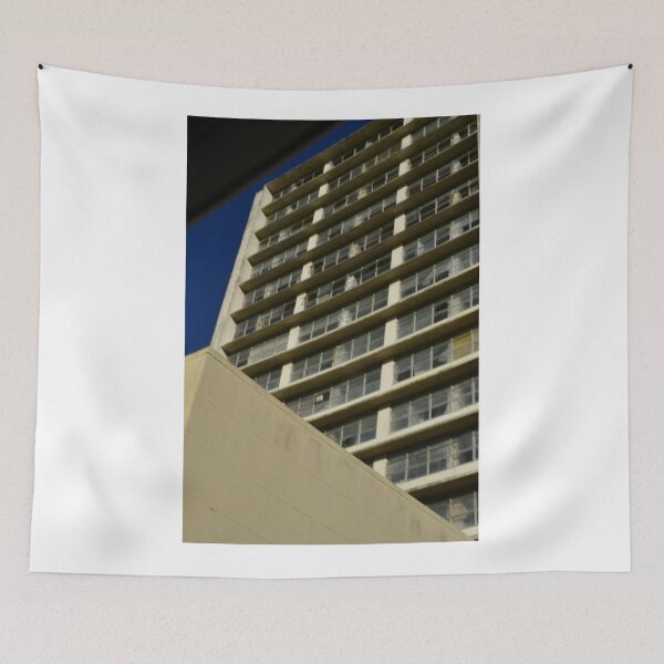 Item preview, A tall hotel apartment in a city on a winter's day. designed and sold by FoxGlove5.