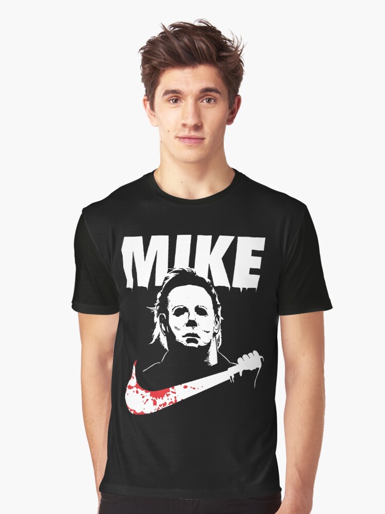 Thumbnail 1 of 5, Graphic T-Shirt, Funny Halloween Mike Myers designed and sold by lilghostslife.