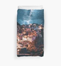 Funda nórdica manarola en la noche con estrellas