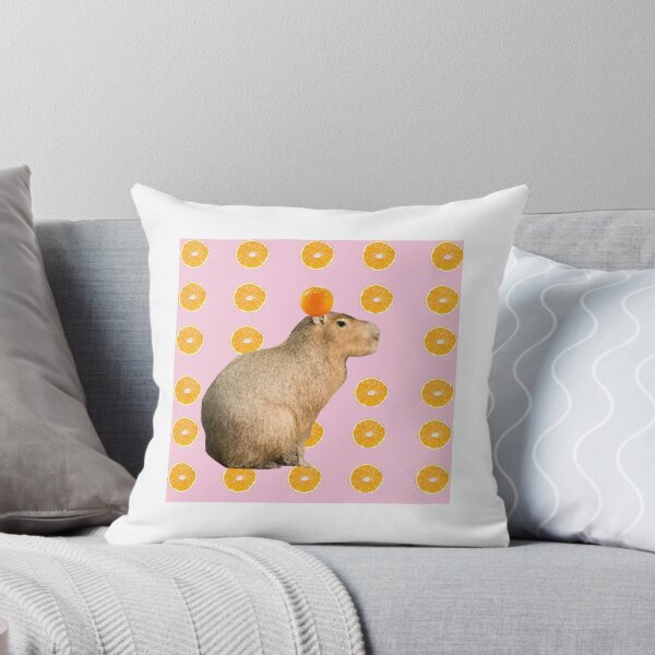 Item preview, Capybara with Orange on Head Pink Background designed and sold by GeekyGirlsGarb.